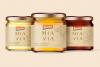 Mia Via honey packaging design mockup of three different honey jars centered with themed illustrations in a continuous line drawing style