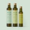 Mia Via packaging design mockup featuring three bottles of olive oil in two different sizes in various shades of green