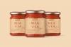 Mia Via Tomato Sauce Jars packaging design mockup centered on a peach background.