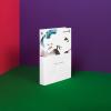 Symrise Perfurmers Compendium index book standing upright, photographed in a studio environment with colorful walls of red, green and purple