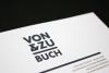 Von and Zu Buch Book Store stationary, zoomed into the letterhead and pictured at an angle on a black background in studio lighting